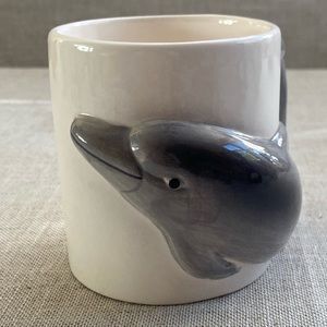 Dolphin handle coffee mug by Gift Corp.